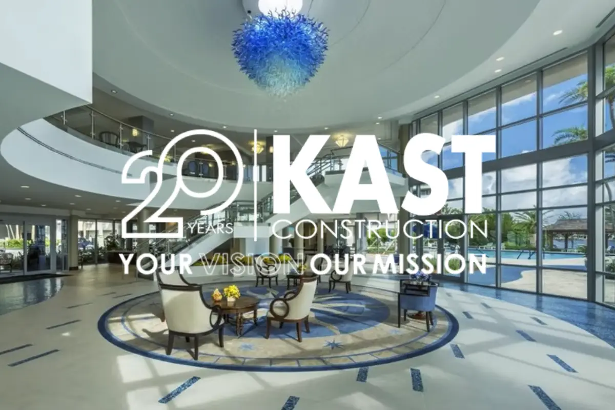 Modern lobby with a blue chandelier and glass walls at IKAST 2021.