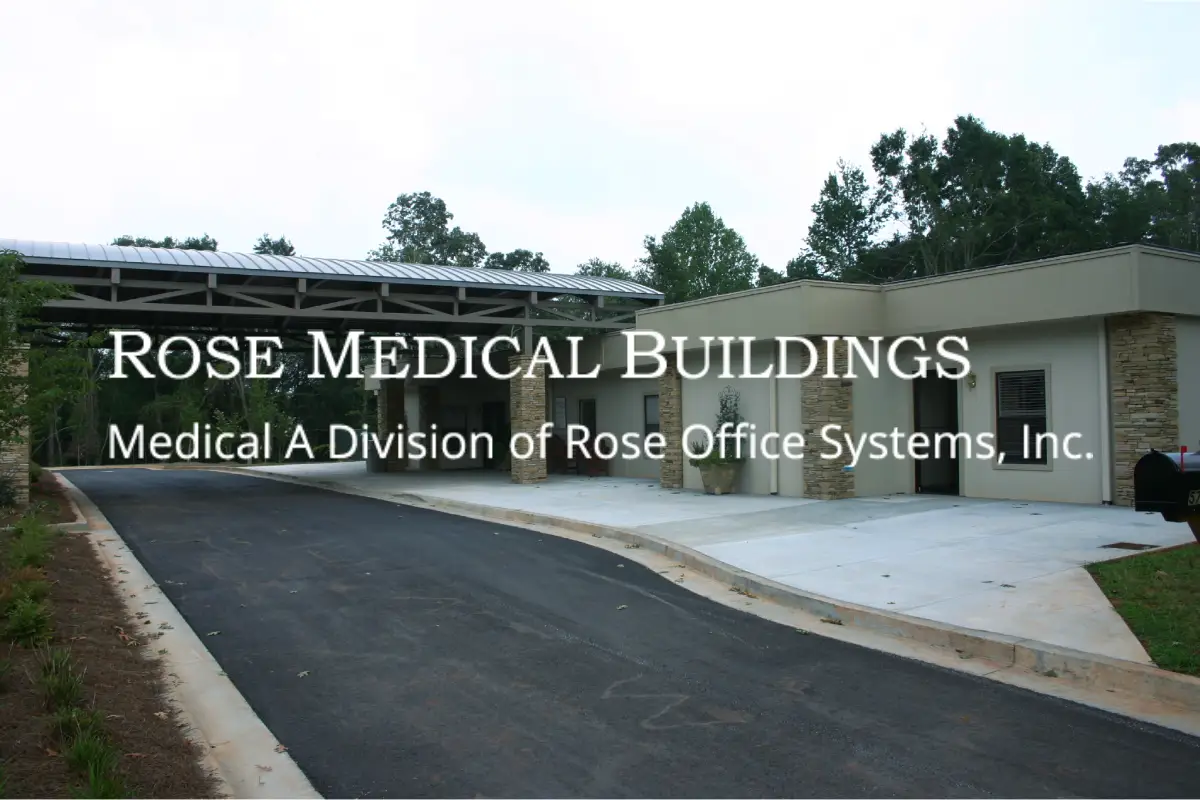 Entrance of Rose Medical Buildings with clear signage and paved driveway.